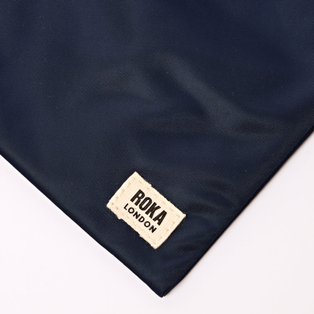 Chelsea Pocket Sling Bag in Midnight Stripe