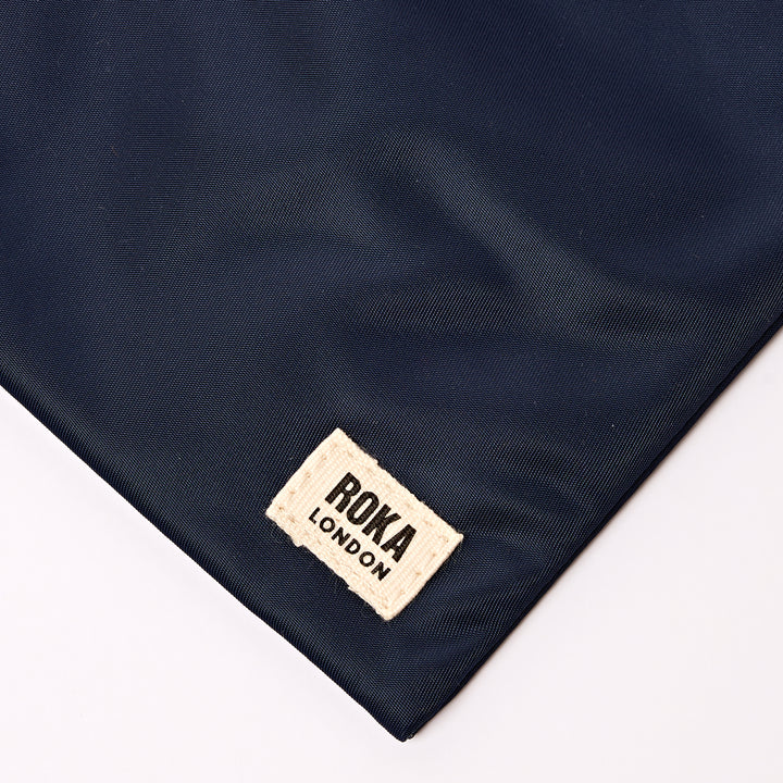 Chelsea Pocket Sling Bag in Midnight Stripe