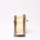 Chelsea Pocket Sling Bag in Wax Paper Stripe