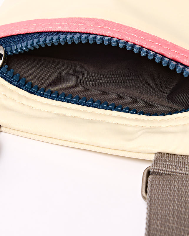 Chelsea Pocket Sling Bag in Wax Paper Stripe