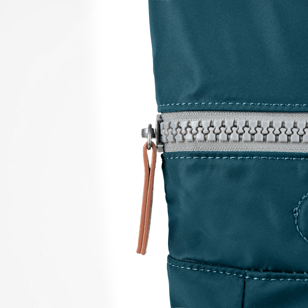 Canfield Roll Top Backpack in Teal