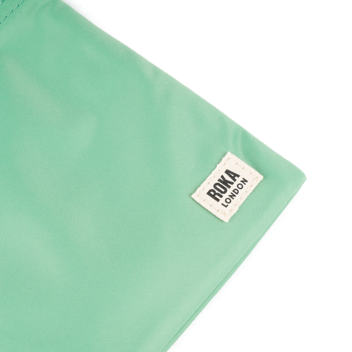 Chelsea Pocket Sling Bag in Matcha
