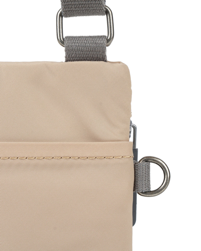 Chelsea Pocket Sling Bag in Sand