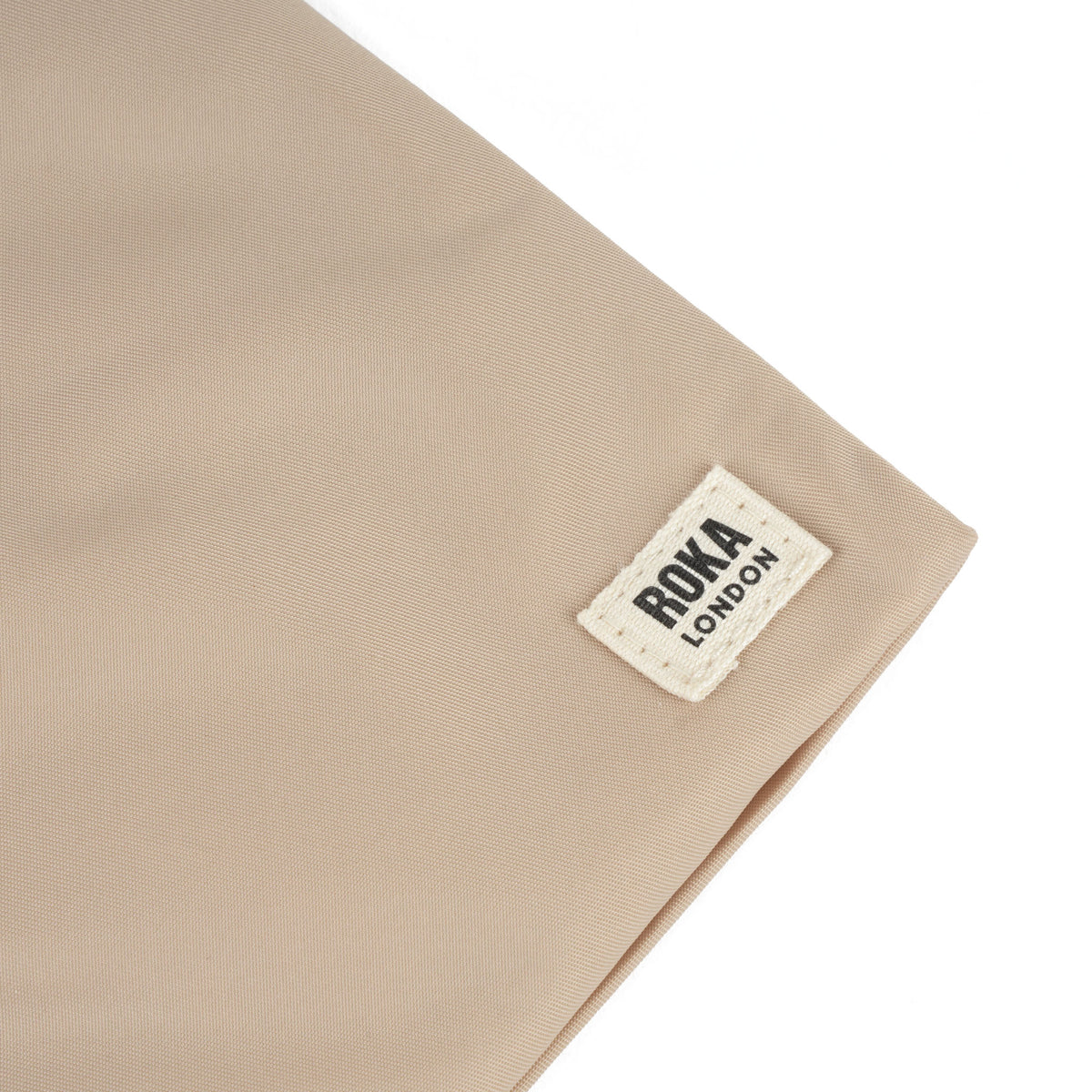 Chelsea Pocket Sling Bag in Sand