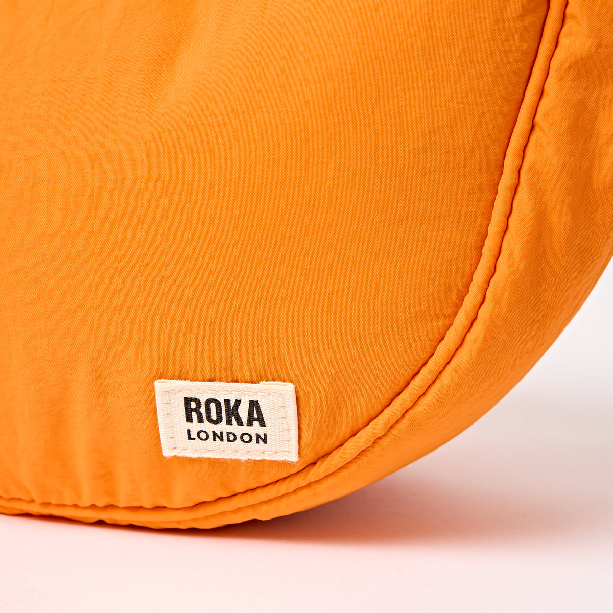 Farringdon Half Moon Bag in Jaffa Orange