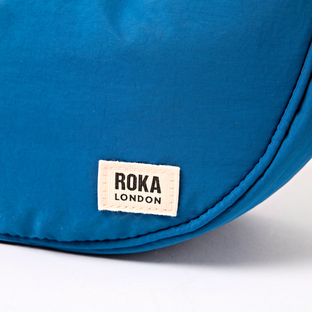 Farringdon Half Moon Bag in Malibu Blue