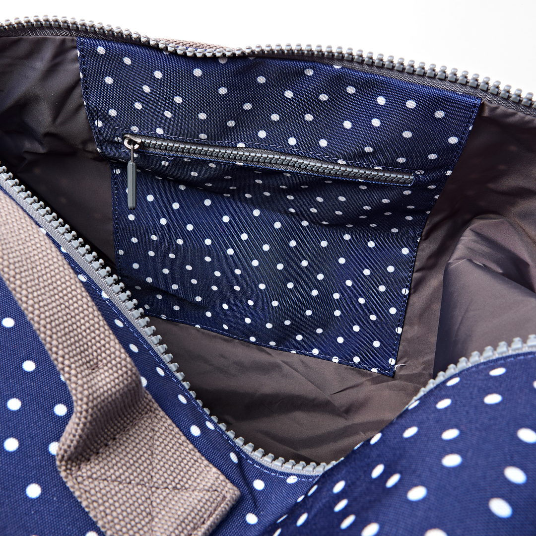 Heathrow Duffel Bag Backpack in Navy Polka Dot
