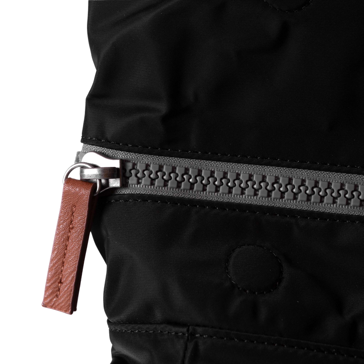 Canfield Roll Top Backpack in Black