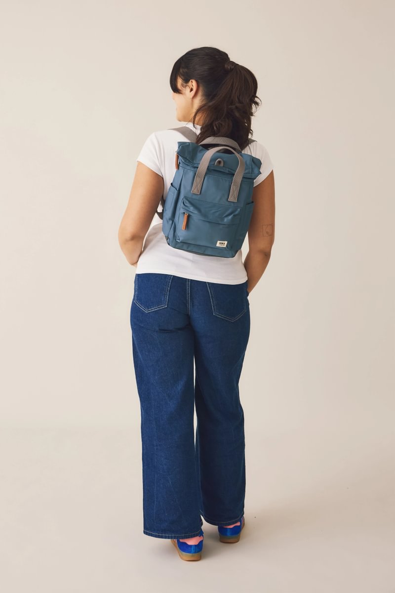 Canfield Roll Top Backpack in Passion Fruit – ROKA London